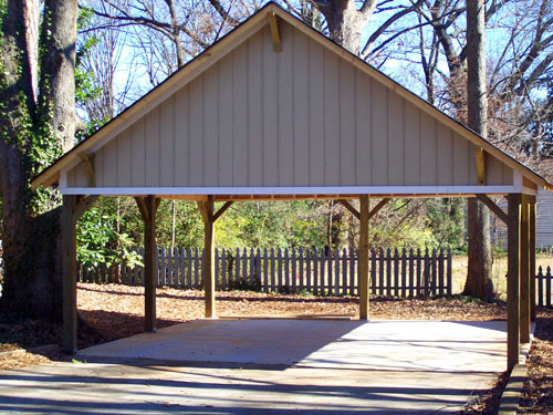 Wood carport with hip roof