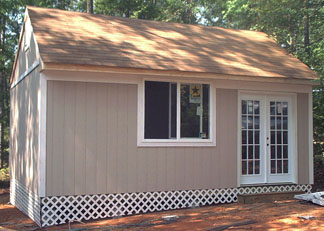 Oxford wood storage building with ramp and two windows