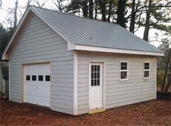 Woodridge single garage door and metal roof